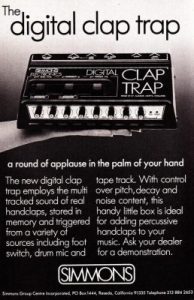 The black and white advertisement for the "Digital Clap Trap" by Simmons showcases the handheld instrument prominently, highlighting its buttons and controls. The text describes it as a versatile tool for creating music, with features such as decay and noise content control. At the bottom, viewers are drawn to the tagline: "a round of applause in the palm of your hand.