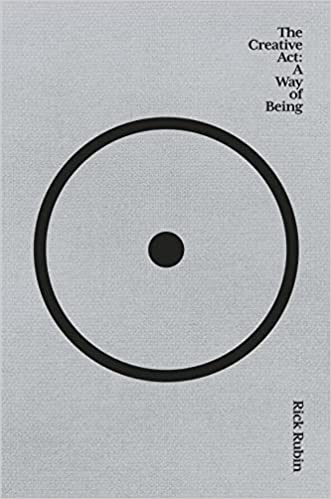 The cover of the book "The Creative Act: A Way of Being" by Rick Rubin is minimalistic, highlighted by a grey background. Central to the design is a bold black circle featuring a smaller black dot in its center. The title and author's name appear in black text.