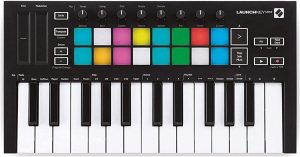 Product photo of the Novation Launchkey Mini MIDI controller, showcasing 16 multi-colored pads, 8 control knobs, touch strips for pitch and modulation, various function buttons, and a 25-key keyboard. All these elements are meticulously arranged on a compact, black-colored device.
