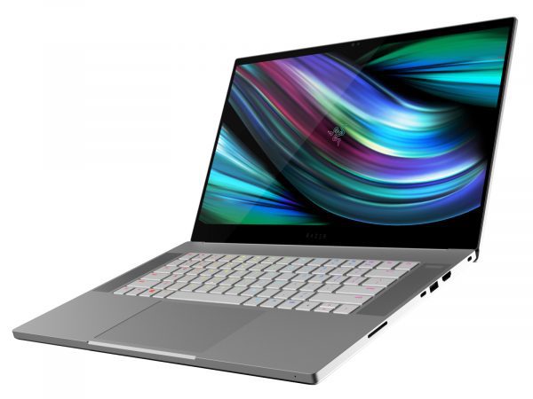 Photo of Razer Blade 15 laptop with a colorful, vibrant display is showcased prominently. Featuring a silver body and equipped with a large touchpad, it also includes a keyboard adorned with white keys that may be backlit. Various ports such as USB and HDMI are visible along the side of the device. The screen bursts to life displaying abstract colorful waves, adding to its dynamic appearance.
