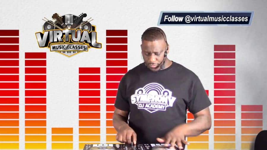 DJ Symphony wearing a Synergy DJ Academy shirt is standing in front of an audio equalizer graphic. Featured on the upper left corner is a logo for Virtual Music Classes, while the handle "@virtualmusicclasses" appears in a text box on the upper right corner.