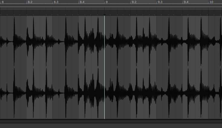 A screenshot of a waveform in Ableton showing its transients out of sync with the grid.